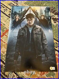 DANIEL RADCLIFFE SIGNED HARRY POTTER Deathly Hallows 12x18 POSTER BECKETT COA